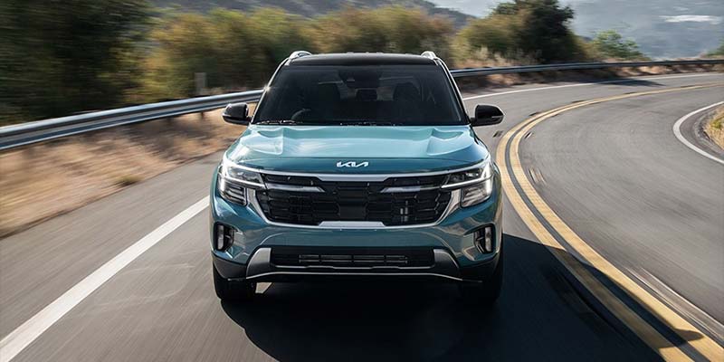 New 2026 Kia Seltos Cruising on Highway in it's front profile